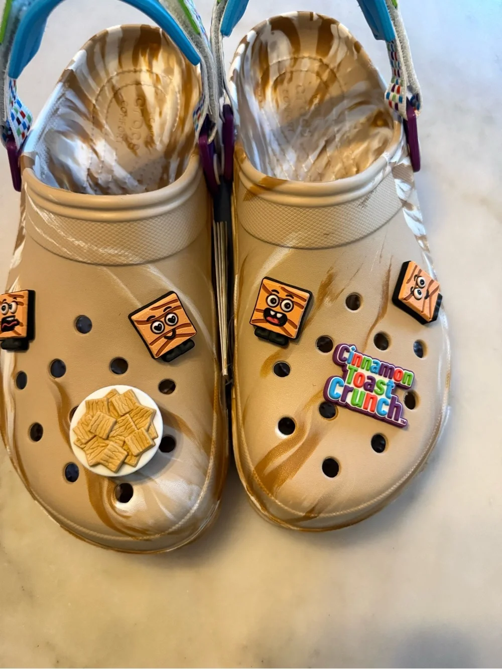 CROCS Beige Marbled Clog with Bright Blue Strap and Multicolor Charms